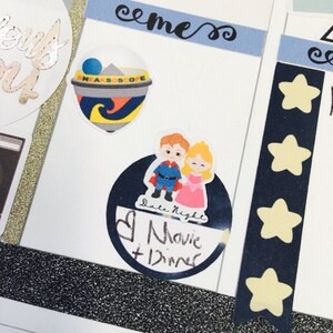 May include: A sticker with a cartoon couple in front of a blue circle with the text "Date Night Movie + Dinner". There are other stickers on the page, including a blue and yellow toy, a blue and white sticker with the text "SNEAKSCOPE", and five yellow stars on a blue background.