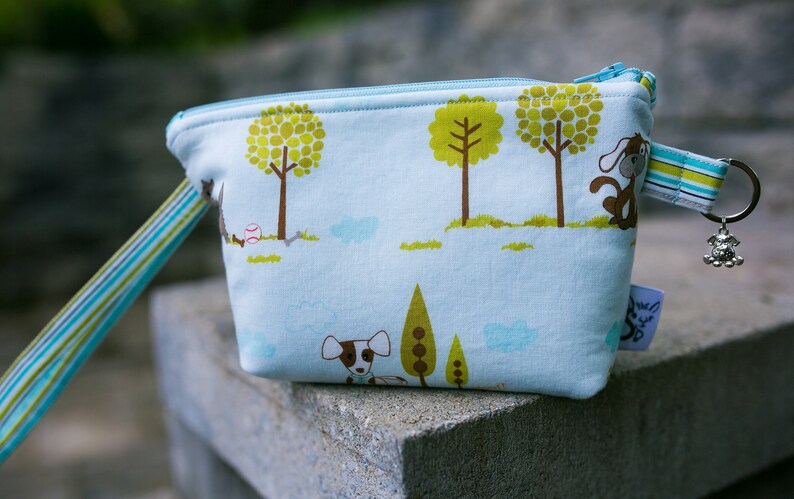 Pooch Pouch Leash BagWristlet in Puppy Time in Blue