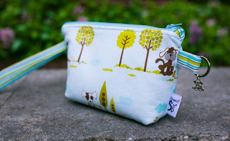Pooch Pouch Leash BagWristlet in Puppy Time in Blue