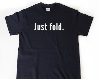 May include: A black t-shirt with the text "Just fold." printed in white on the front.