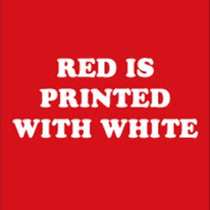 May include: Three squares of fabric, one blue, one red, and one black, each with the text "[color] IS PRINTED WITH WHITE" in white letters.