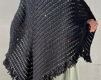 Beautiful crocheted shawl with long fringe