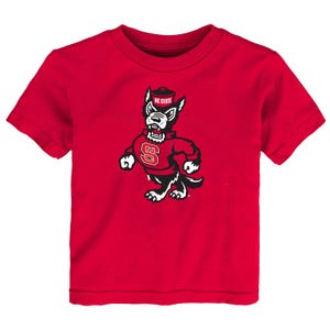 May include: Red short-sleeved t-shirt with a cartoon wolf wearing a red shirt and a hat that says "NC STATE".