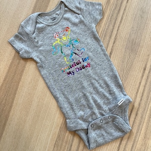 May include: Gray baby onesie with a colorful bear graphic and the text "Grateful for My Daddy".