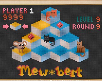 May include: Cross-stitch pattern of a retro video game called "Mew*bert" with a cat and mouse on a platform. The game is at level 9, round 9, and player 1 has 999 points.