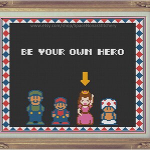 May include: Cross stitch pattern featuring a pixelated image of four characters from a video game. The characters are standing in a line, with the text "BE YOUR OWN HERO" above them. An arrow points down to the character in the middle, who is wearing a pink dress and a crown.