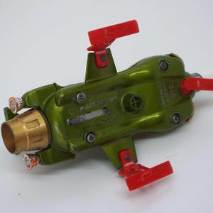 A Dinky Toys No.351 boxed Interceptor as seen in Gerry Anderson's UFO TV programme SHADO, together w A Dinky Toys No.351 boxed Interceptor as seen in Gerry Anderson's UFO TV programme SHADO, together w