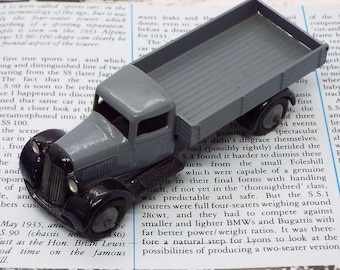 Camión volquete Dinky 25e vintage de los años 40, color gris, con mecanismo de empuje y tracción, de Meccano Ltd, tipo 4, chasis negro