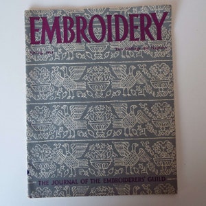 May include: A vintage magazine cover for "Embroidery", the journal of the Embroiderers' Guild. The cover features a blue and white pattern of stylised birds and flowers. The text "Spring 1954" and "Two Shillings and Sixpence" are visible.