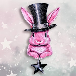 May include: A pink rabbit wearing a black top hat with a black star hanging from its paw. The rabbit is against a pink and white background with white stars.