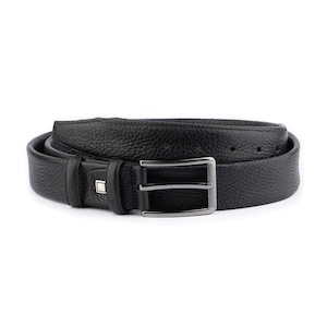 May include: A black leather belt with a silver buckle. The belt has a textured grain pattern.