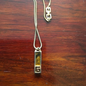 1977 GIVENCHY Pendant on Goldtone Snake Chain Fully signed Original Authentic Unique Piece Collectible Vintage Retro Enamel Panel