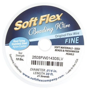 May include: A spool of Soft Flex Beading Wire, labelled "Fine", with a diameter of 0.014 inches and a length of 30 feet. The wire is made of knot-tying stainless steel, nylon coated, and has a test strength of 10 pounds. The label also states that the wire is for use with seed beads and freshwater pearls. The spool is labelled "250SFW01430SLV" and is made in the USA.
