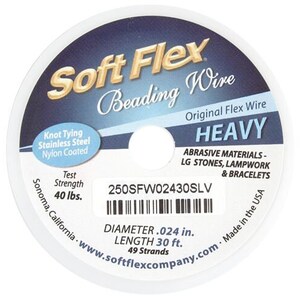May include: A spool of Soft Flex Beading Wire, labelled "Heavy", with a diameter of 0.024 inches and a length of 30 feet. The wire is made of stainless steel and is nylon coated. It is designed for use with abrasive materials, large stones, lampwork, and bracelets. The spool is white with blue and gold lettering.
