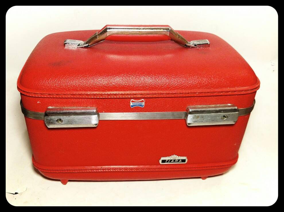 american tourister train case
