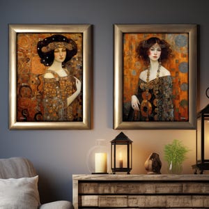 May include: Two framed paintings of women in gold and black clothing with intricate details. The paintings are set against a dark grey wall with a wooden table and decorative items in front of them.