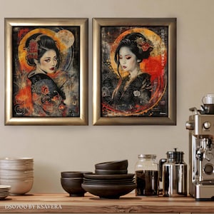 two framed artworks of women, each with a different style and color scheme, displayed on a wall above a wooden table with various kitchen items such as bowls and a coffee maker.