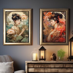 May include: Two framed art prints featuring women with floral designs. The prints are in gold frames and have a vintage aesthetic.