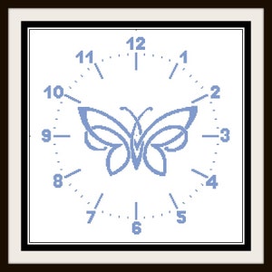 May include: A square wall clock with a white face, black border, and a brown frame. The clock features a light blue butterfly design in the center, surrounded by blue numerals and minute markers.