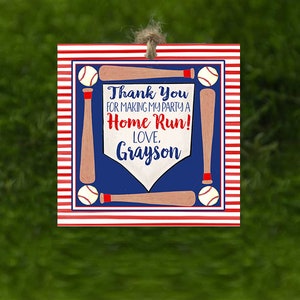 May include: Red, white, and blue baseball-themed thank you sign with the text "Thank You for making my party a Home Run! Love, Grayson".