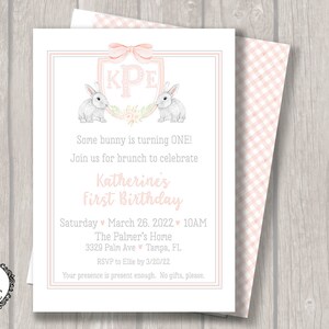 May include: Pink and white gingham patterned invitation with a white border. The invitation features a pink ribbon with a monogram "KPE" and two white bunnies. The text reads "Some bunny is turning ONE! Join us for brunch to celebrate Katherine's First Birthday. Saturday March 26, 2022 10AM The Palmer's Home 3329 Palm Ave Tampa, FL RSVP to Ellie by 3/20/22 Your presence is present enough. No gifts, please."