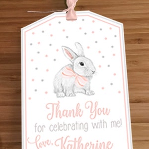 May include: Pink and gray thank you tag with a white bunny wearing a pink bow. The tag has a polka dot pattern and the text "Thank You for celebrating with me! Love, Katherine".