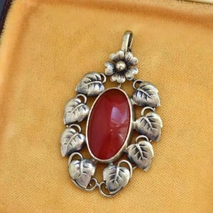 Antique arts & crafts carnelian silver floral pendant