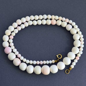 Vintage natural angel skin coral graduated beads necklace, gold filled clasp