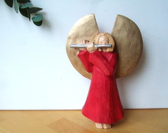 Wooden angel with flute in red dress, 20 cm,
