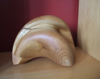 Wooden sculpture made from robinia trunk