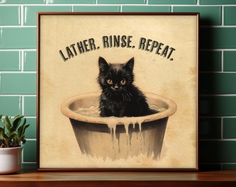 May include: A vintage-style print featuring a black cat sitting in a white bathtub with the text "LATHER. RINSE. REPEAT."