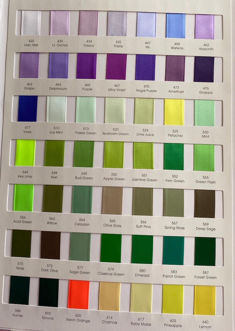 May include: A colour chart showing satin ribbons in various shades, including purple, green, yellow, and orange. Each ribbon is labelled with a colour name and number, such as "Lilac Mist" and "Key Lime".