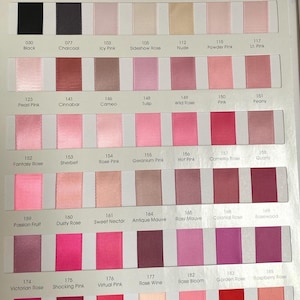 May include: A colour chart displaying satin ribbon swatches in a range of hues, including white, grey, pink, and red. Each swatch is labelled with a colour name and number. Suitable for crafts, sewing, and event decorations.