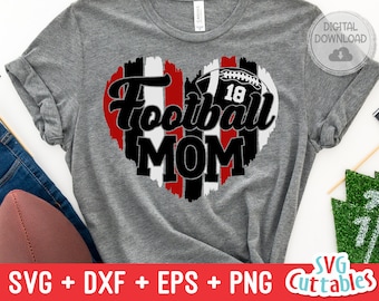 May include: Gray t-shirt with a red, white, and black heart design. The heart features a football with the number 18 and the text "Football Mom".