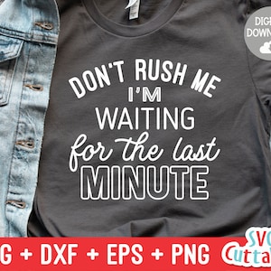 May include: A dark gray t-shirt with white text that reads "Don't rush me I'm waiting for the last minute".