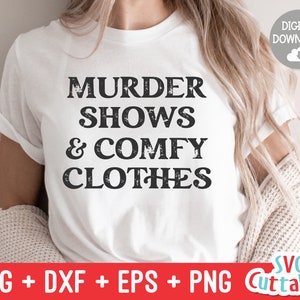 May include: White t-shirt with black text that reads "Murder Shows & Comfy Clothes".
