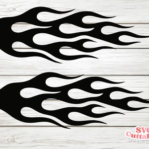May include: Two black flame designs, one above the other, on a white wood-grain background. The flames are stylized with curved edges and pointed tips, suitable for vehicle or graphic design projects. The image includes the text "SVG Cuttables".