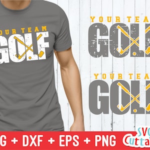 Może przedstawiać: Szary T-shirt z napisem "YOUR TEAM GOLF" w kolorze białym z efektem postarzenia. Tekst jest nałożony na ż&oacute;łtą grafikę przedstawiającą dwa skrzyżowane kije golfowe.