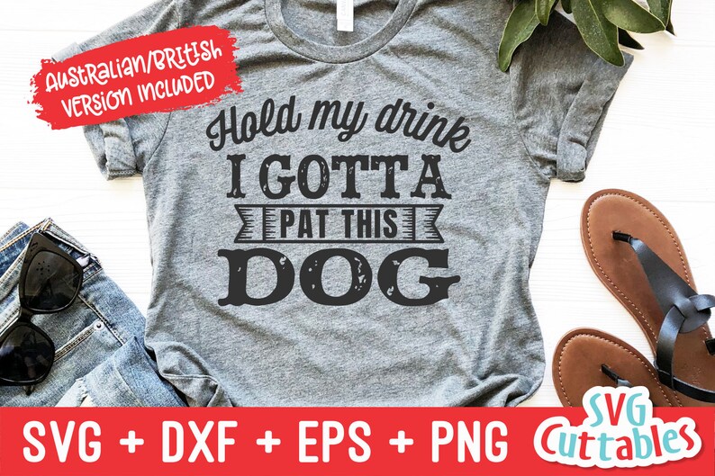 May include: Gray t-shirt with the text "Hold my drink I GOTTA PAT THIS DOG" in a distressed font.