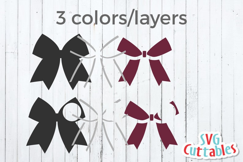Puede incluir: Tres archivos de corte SVG en capas de un lazo. El lazo es negro, burdeos y blanco. El texto "SVG Cuttables" est&aacute; en la esquina inferior derecha de la imagen.