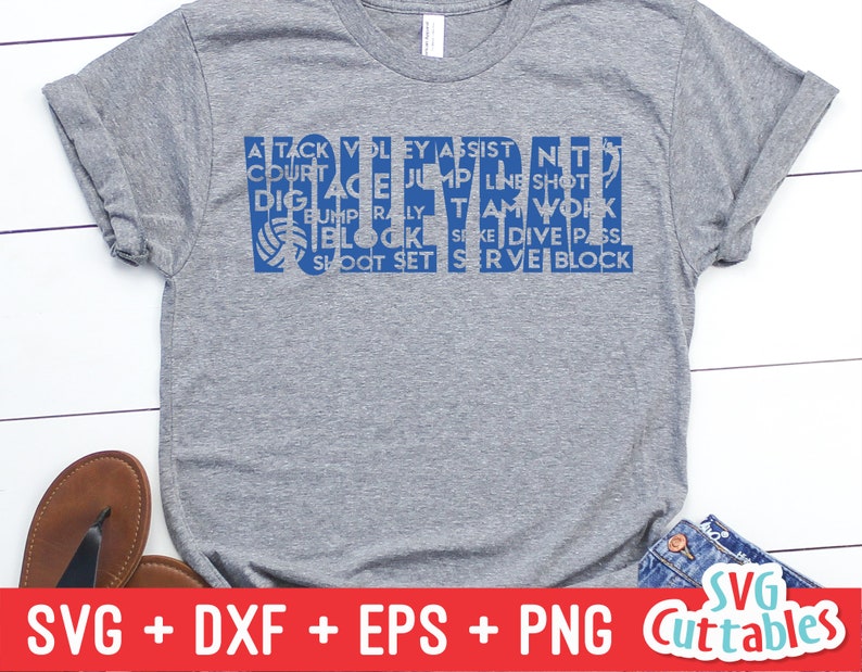 May include: A gray t-shirt with a blue graphic design that says "VOLLEYBALL" with a volleyball graphic and words like "attack", "jump", "serve", "block", and "dive".