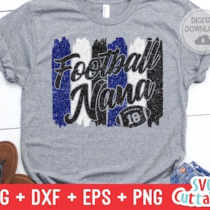 May include: A gray t-shirt with a blue, white, and black glitter design that says "Football Mama" with a football graphic.
