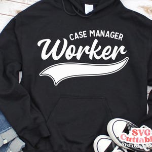 May include: Black hooded sweatshirt with white text that reads "Case Manager Worker" in a baseball-style font with a white curved line underneath.