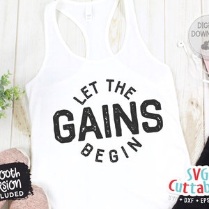 May include: White tank top with black text that reads "Let the Gains Begin". The text is in a distressed font style.