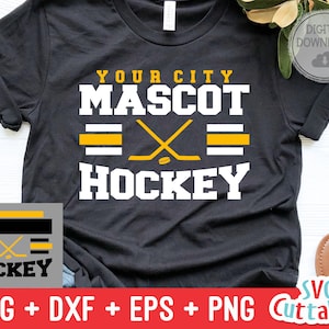 May include: Black t-shirt with a white graphic design that says "YOUR CITY MASCOT HOCKEY" with a hockey stick and puck. The graphic is in yellow and black. The text "SVG + DXF + EPS + PNG Cuttables" is at the bottom of the image.