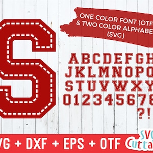 May include: Red varsity-style font alphabet with a white outline. The alphabet includes uppercase letters, numbers, and punctuation marks. The font is available in one color (OTF) and two colors (SVG).