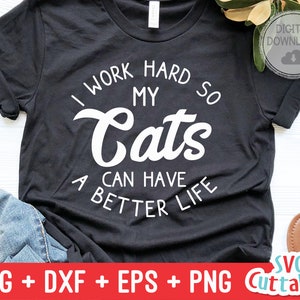 May include: Black t-shirt with white text that reads "I work hard so my cats can have a better life".