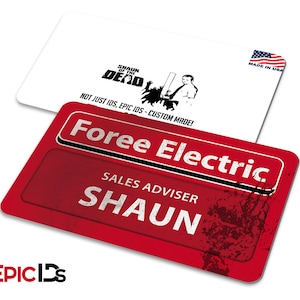 May include: Red and black name tag with the text "Foree Electric" and "Sales Advisor Shaun". The tag has a bloody zombie hand print on it and the text "Shaun of the Dead" in the background.