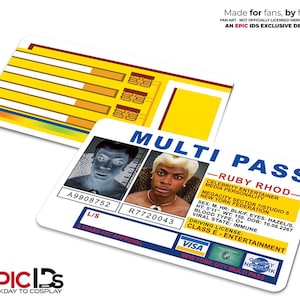 May include: Two white Multi Pass cards with yellow and blue accents. One card features a photo of a person with blonde hair, the other has a photo in negative. Text includes "Ruby Rhod" and "Visa" logos.