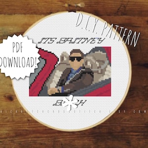 May include: A cross-stitch pattern featuring a man in sunglasses driving a red car. The pattern includes the text "It's Britney, B*tch" and "DIY Pattern".